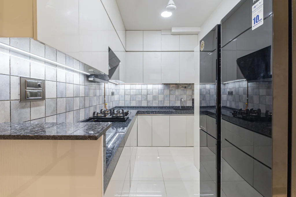 L-shaped kitchen interior design - spriha jain interior
