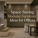 Modern office with space-saving modular furniture, smart storage solutions, ergonomic workstations, and contemporary interior design by Spriha Jain Interiors